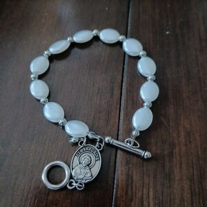 Silver and White Beaded Bracelet St. Peregrine Charm